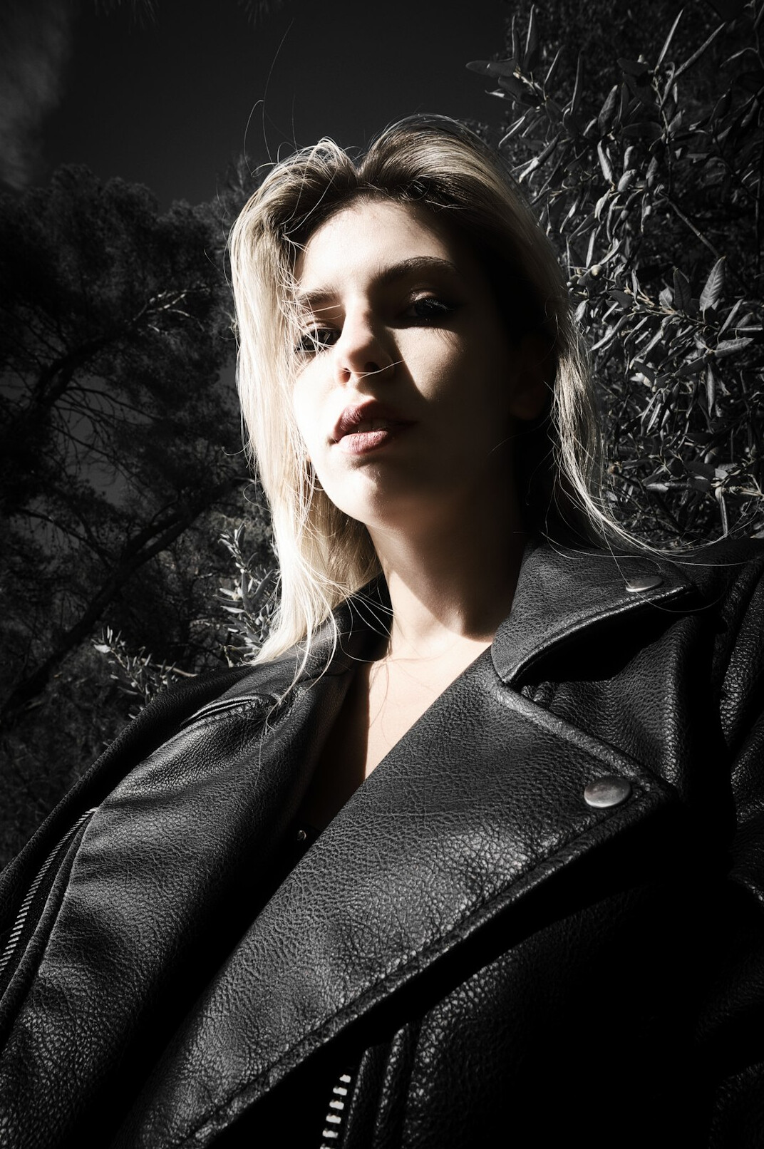 Studio portrait of a Polish woman instructor in a dark blazer