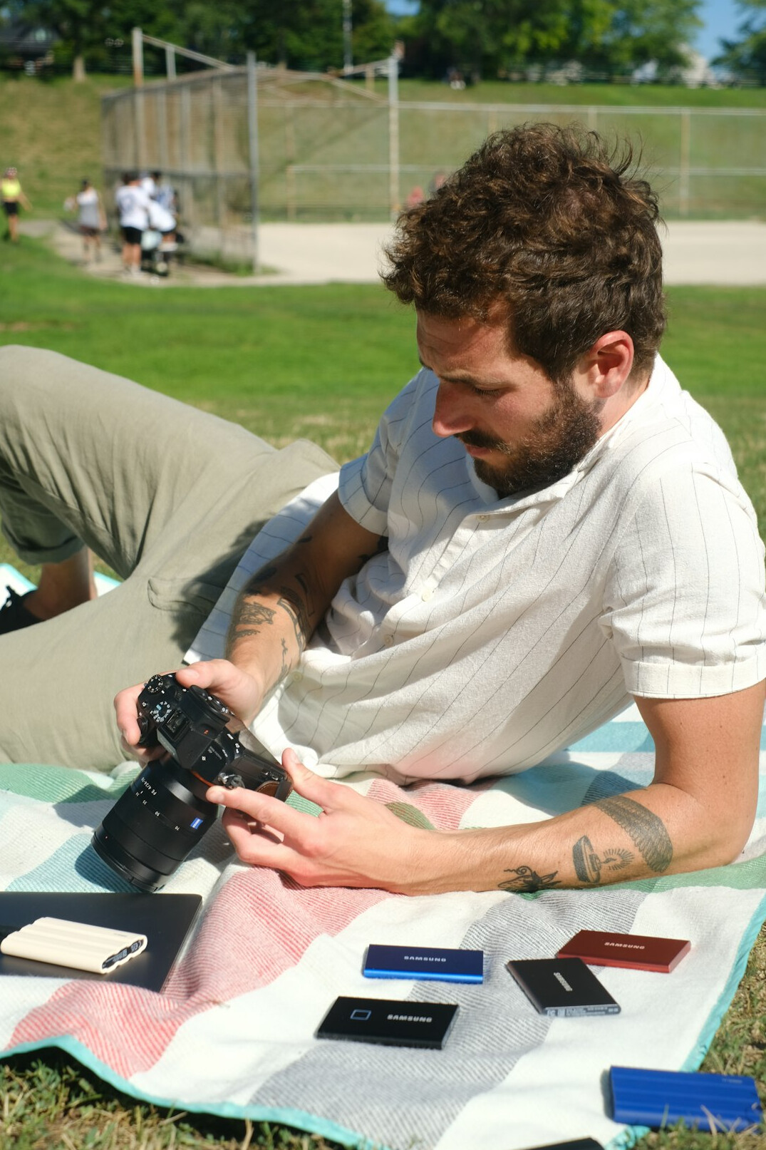 Photographer reviewing contact sheets on a light table